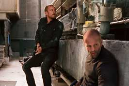 The Mechanic - 8 x 10 Color Photo #1